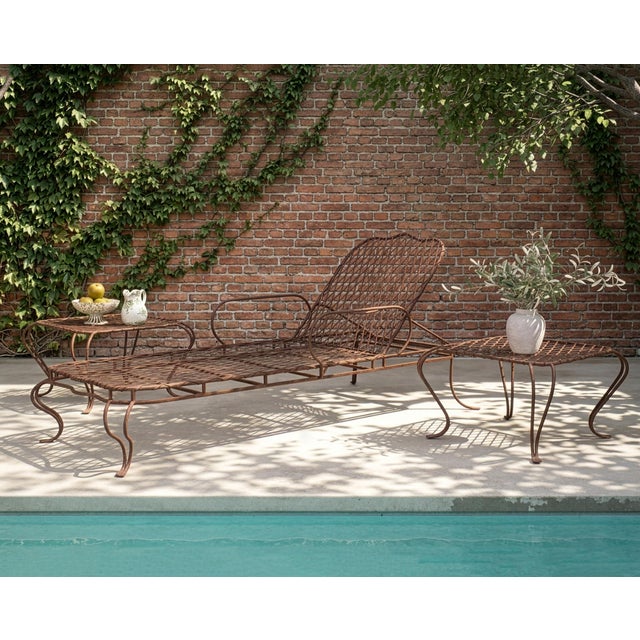 A whimsical pair of twig iron patio and garden side tables or drinks tables designed by Rose Tarlow. The distinctive pair...
