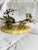 Metal Roman warrior with bow aimed while riding in a chariot pulled by horses. Mounted on a marble base. Could be used as...