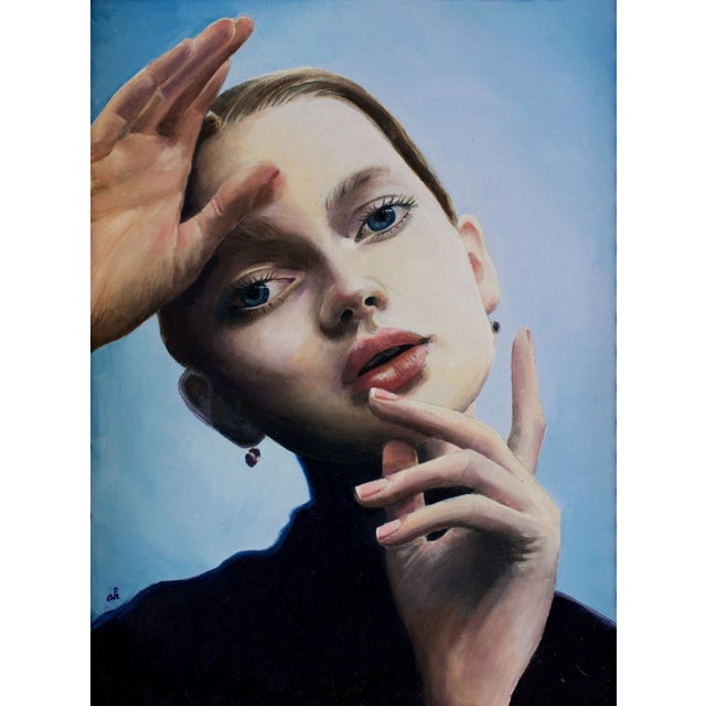 The artwork presents a striking portrait of a young woman, her serene expression and delicate features captured with...