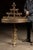 Striking large-scale brass candelabrum table composed from two distinct antique elements married together by our in-shop...