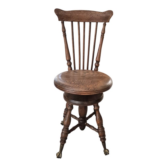 Antique Oak Piano Stool With Adjustable Height, Windsor-Style Spindles, and Claw Feet. For Sale