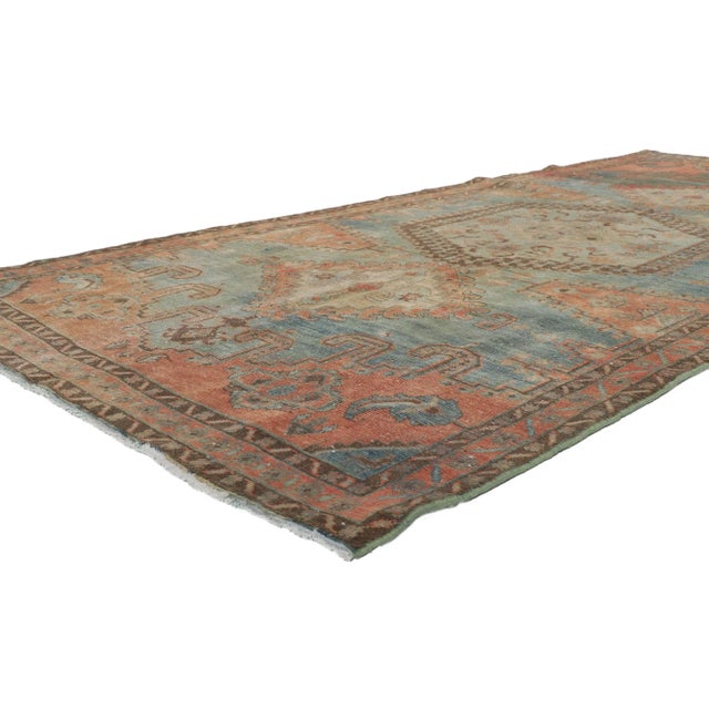 60978 Vintage-Worn Persian Viss Rug, 05'02 x 11'03. Introducing a captivating fusion of tribal enchantment and rustic...