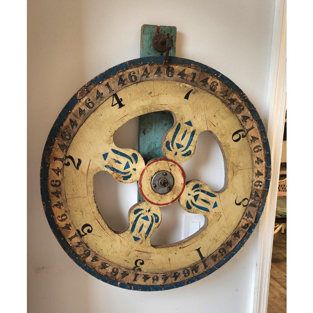 This early 20th-century carnival "Wheel of Fortune" is a striking example of American folk art. Likely dating from the...