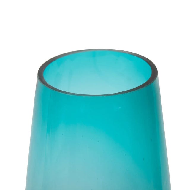 The Large Teal Blue Vase The crashing waves with their white caps became the inspiration for these beautifully hand...