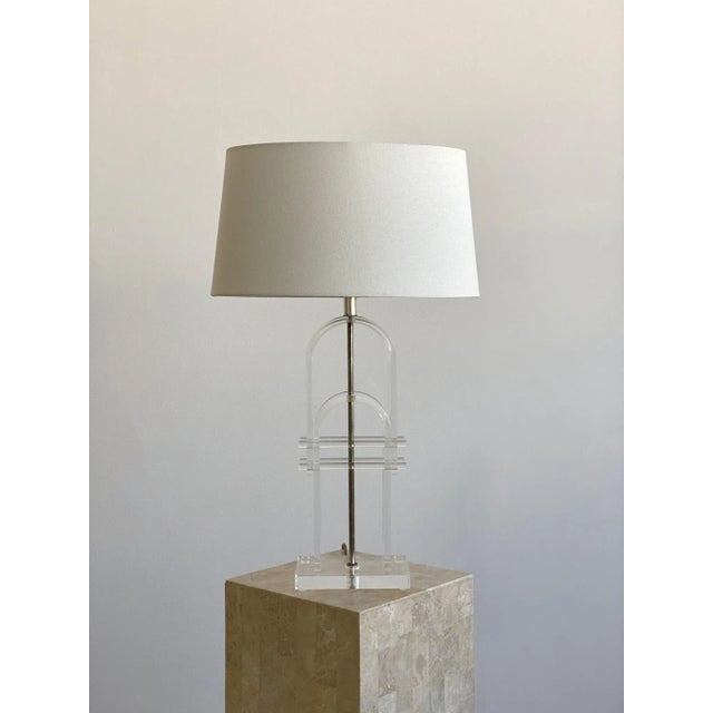 Vintage Double Arched Lucite Lamp with Pierced Rod Detail, Circa 1970s. Clear lucite nesting arches pierced horizontally...