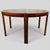 Pair of consoles that can form a 140cm round table