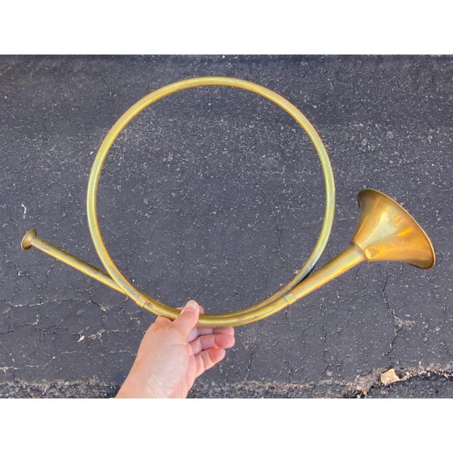 Set of two vintage brass horns to add a festive feel to any tablescape, to add into a wreath, or hang inside or outside...