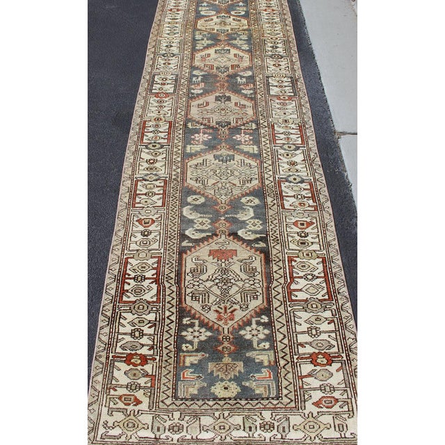 Tribal Long Persian Kurdish Runner With Medallion Design in Charcoal, Ivory and Red For Sale - Image 3 of 14