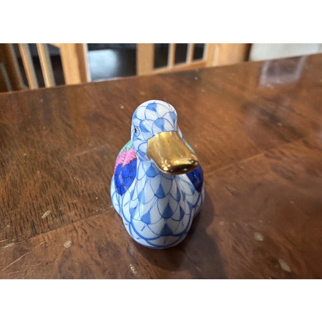 Add timeless European elegance to your collection with this exquisite Herend duck figurine, pattern #15336, beautifully...