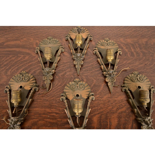 A gorgeous set of six Art Deco period bronze wall sconces In the manner of Tiffany Studios By Mid-West Manufacturing Co....