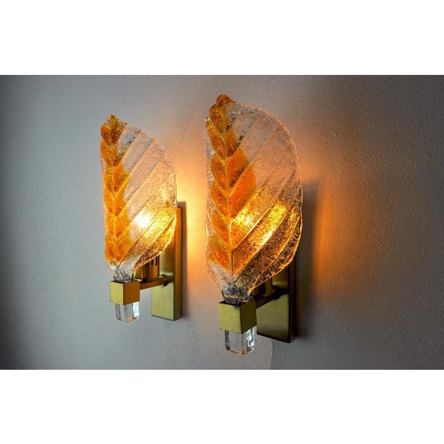 Very nice pair of carl fagerlund sconces for lyfa dating from the 70s. The sconces are made up of a gilded metal structure...