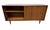 Elevate your space with this stunning 1960s American-made walnut sliding door cabinet, a true Mid-Century Modern classic....