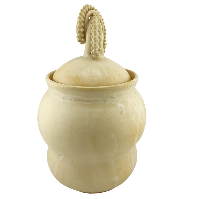 A sculptural contemporary studio pottery vessel by American ceramic artist Liv Egan, distinguished by its whimsical...