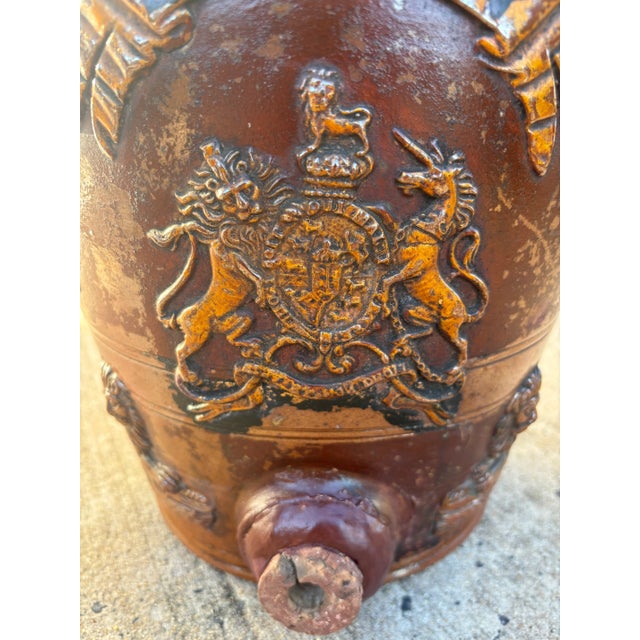 An English 19th century stoneware Brandy dispenser, used in a pub back in the day, with a crusty old finish. At some...
