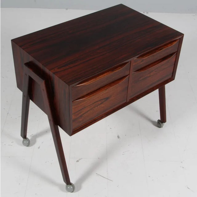 Erling Torvits sewing nest in rosewood. Four drawers. On wheels. This piece is attributed to the mentioned designer/maker....