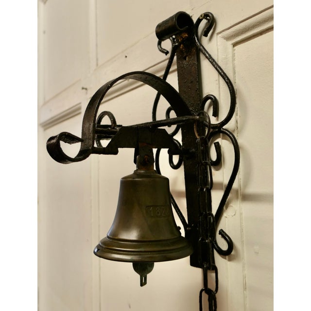 19th Century Black Wrought Iron Alpine Front Door Bell This is a delightful and very unusual item, the brass bell is...