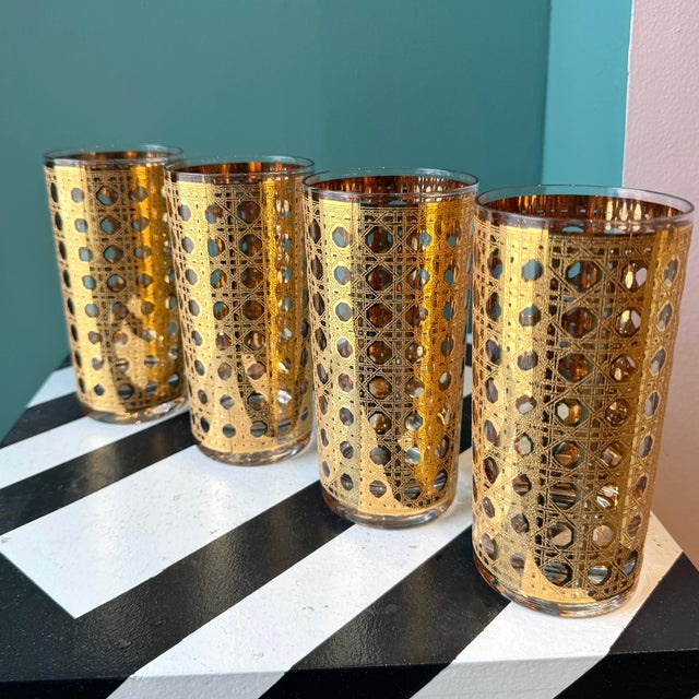 A stunning set of vintage Culver highball glasses with 22K gold Cannella Rattan pattern on the outside. Check out our...