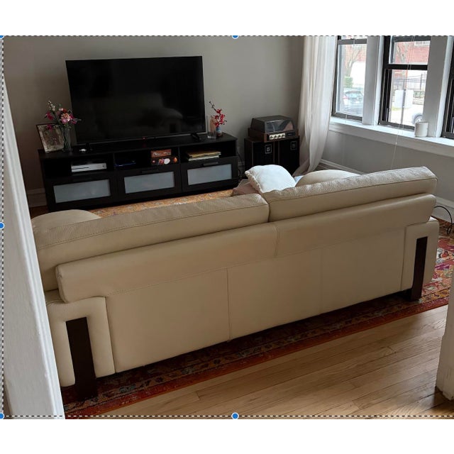 High-quality designer sofa made in Italy with genuine natural leather in a beautiful cream color. The leather is nicely...