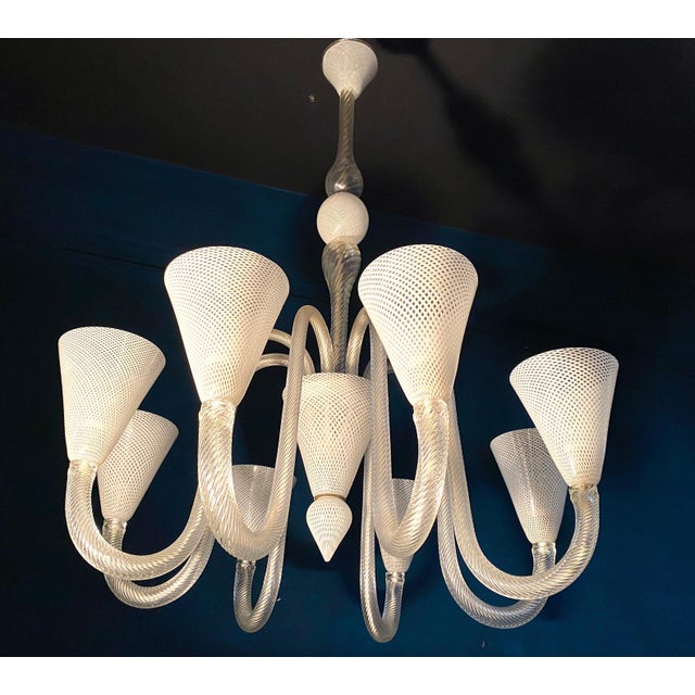 Elegant Venini Art Deco hand blown reticello Murano chandelier with six arms. Six E 27 light bulbs. We can rewire for your...