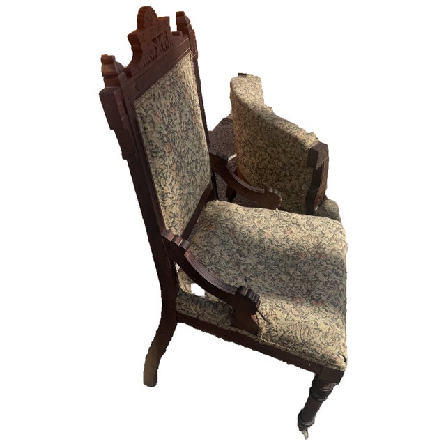A striking example of American Eastlake design, this three-piece parlor suite — a settee and two matching armchairs — is...