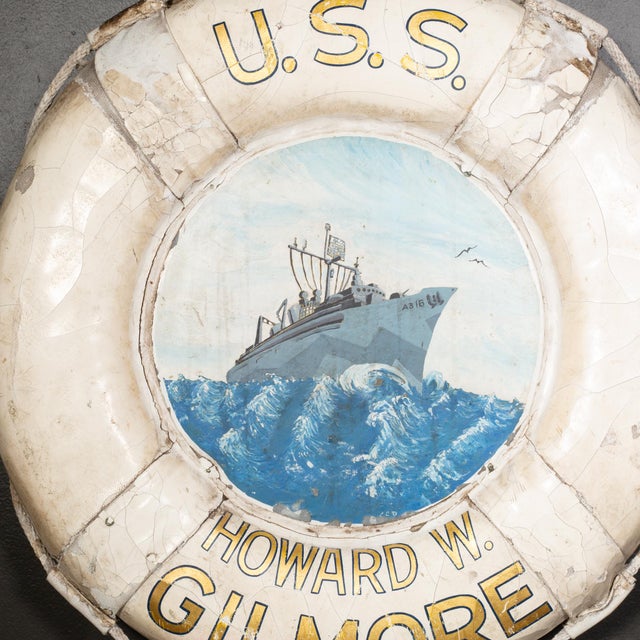 ABOUT Set sail through history with this charming 1944 life preserver from the U.S.S. Howard W. Gilmore. This genuine WWII...