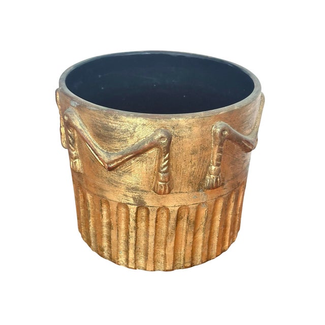 Vintage 1970s gold tassel decorated indoor/ outdoor pottery planter. Made in Italy and signed underside. This planter has...