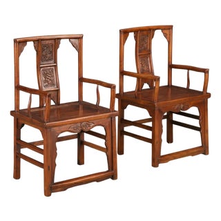 Pair of Qing Dynasty Chinese Horseshoe-Back Armchairs in Carved Elmwood For Sale
