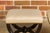 A pair of Austrian 1900s black stools from Vienna with X-Form bases, turned stretchers and new custom linen upholstery....