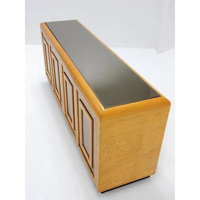 Stunning burl wood and mirror buffet by Romweber Furniture, circa 1970s. Cabinet made of exotic burl wood on a black...