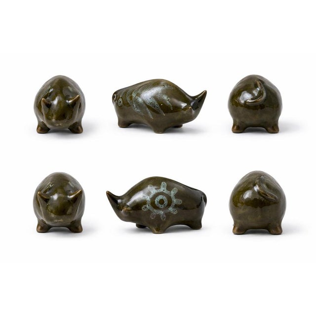 A charming pair of vintage studio pottery bulls attributed to Elizabeth Skipworth for Lotus Pottery. These characterful...