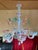 Stunning 1950s Murano blown glass chandelier. Made of clear, blue, pink, and yellow glass. Beautifully handcrafted. It...