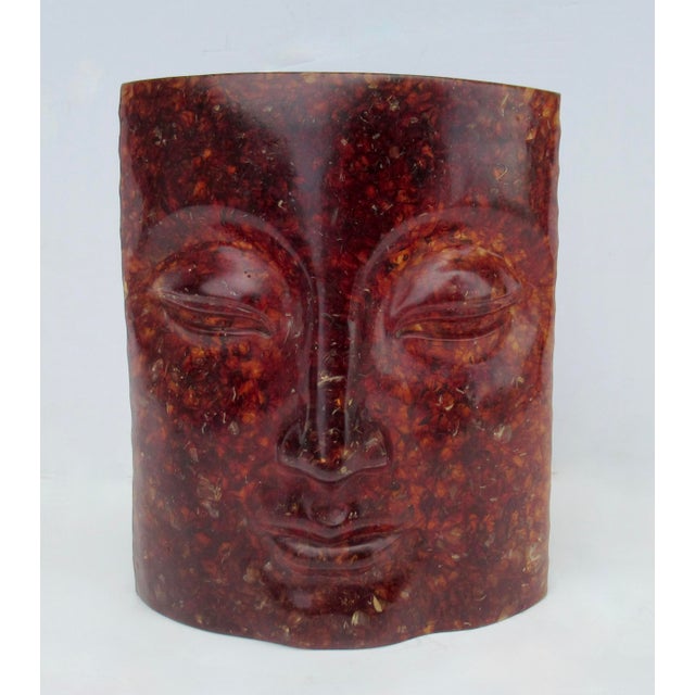 A vintage, cast resin of a responded Buddha face in a curved format. A thick wal, with scalloped edging, BUT the beauty is...