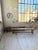 Set of two antique benches with a rustic look – square legs and a central crossbar. Restored, sanded, treated, and...