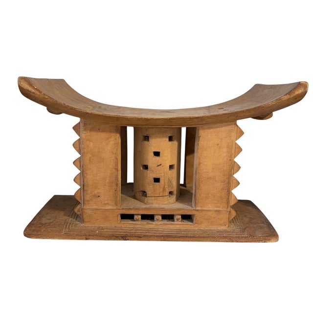 This exceptional and rare VINTAGE large Ashanti stool, traditionally reserved for royalty, features elegant curved lines...