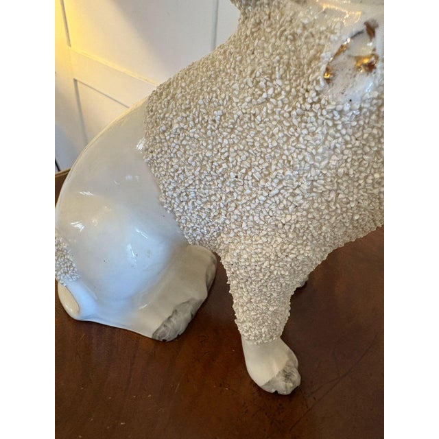 Pair of antique Victorian quality Staffordshire poodles having lovely curly poodle hair, gold collars, black nose with...