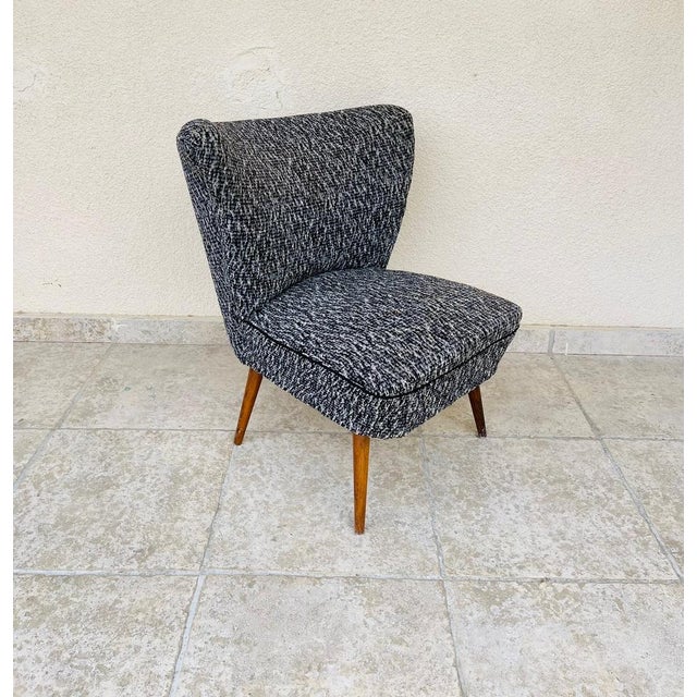 Elegant vintage cocktail chair, also known as a "shell" chair, typical of french design from the 1950s and 60s. its...