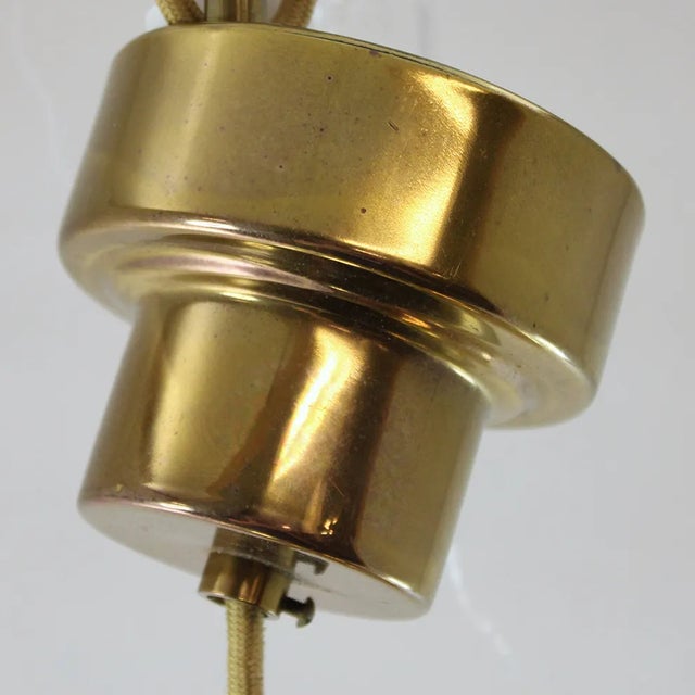Large Mid-Century Brass Pendant Lamp from Bergboms, 1960s, in Good conditions. Designed 1960 to 1969 This piece is...