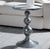 Sculptural base clad in zinc, with gray Scagliola stone inset top. The intentional impasto of the zinc texture creates an...