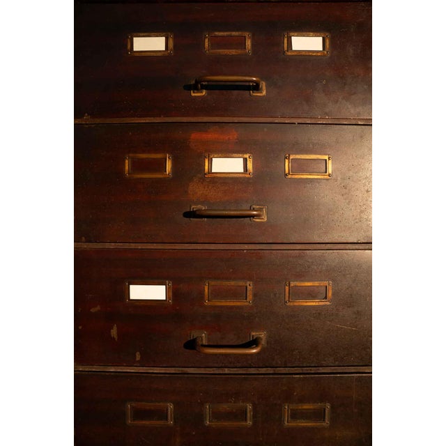 Metal filing cabinets from the 70s. They were in a workshop. They are very heavy, a beautiful red/amaranth and the drawers...