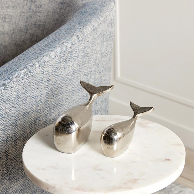 Quite a bit smaller than the real thing, these modern whale sculptures have just as much charm. Made of solid aluminum,...