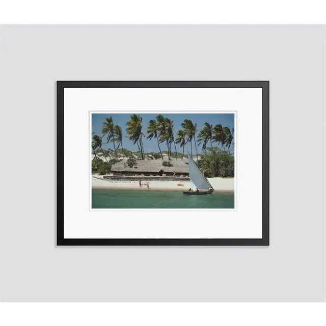 Figurative Slim Aarons 'The Lure of Lamu' Archival Pigment Print Framed in Black For Sale - Image 3 of 3