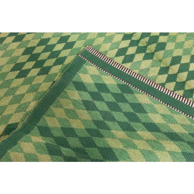 Mid-20th Century Swedish Double Sided Green Rug Size: 6'3" × 9'7" (190 × 292 cm) A striking example of Scandinavian...