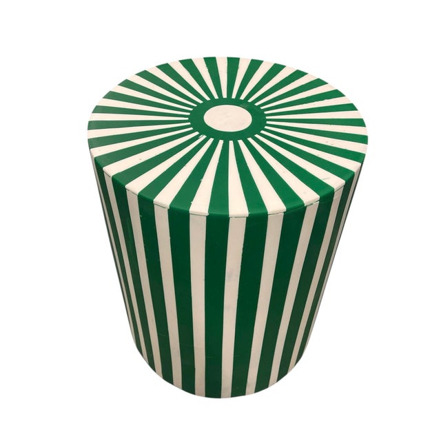 Handcrafted recently in Morocco, this vibrant drum-shaped side table features a bold, linear aesthetic rooted in...