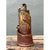This vintage abstract pottery vase presents a boldly sculptural silhouette, its dynamic, tiered form rising through...