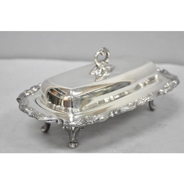 Vintage FB Rogers 1959 Victorian Style Silver Plated Footed Covered Butter Dish. Circa Mid 20th Century. Measurements:...
