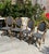 Featuring 4 chic French Bistro chairs with a perfect round marble table top with a black iron stand. These chairs are...