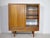 Original Danish Design highboard by Axel Christensen for Aco Møbler from the 1960s. Made of teak with sliding doors, two...