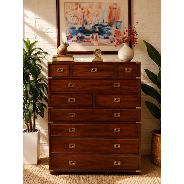 Campaign style with rich mahogany tones and beautifully aged brass detailing. The impressive facade combines smaller upper...