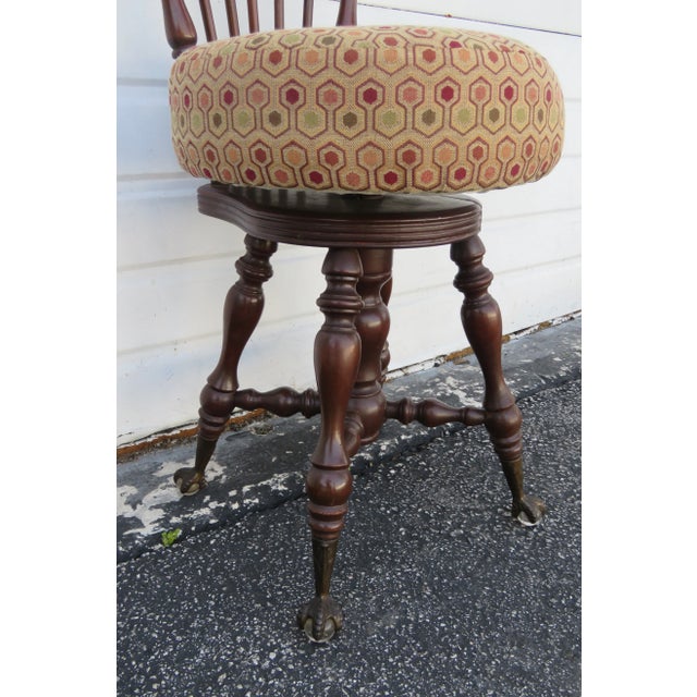 This brilliant piano stool chair is made of wood and solid wood, and is in good condition. This beautiful piano chair was...