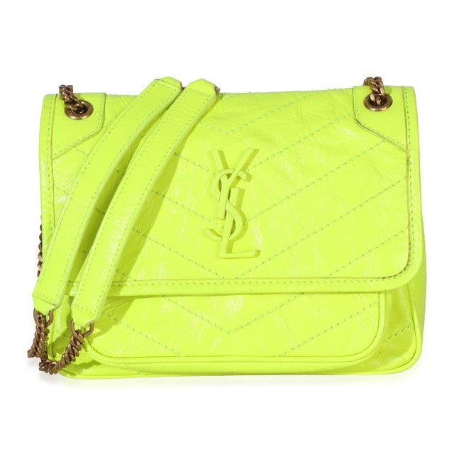 Item #: 154744 Exterior Material: Leather MSRP: 3,150 Interior Material: Fabric Size: Small Features Interior: Two slip...